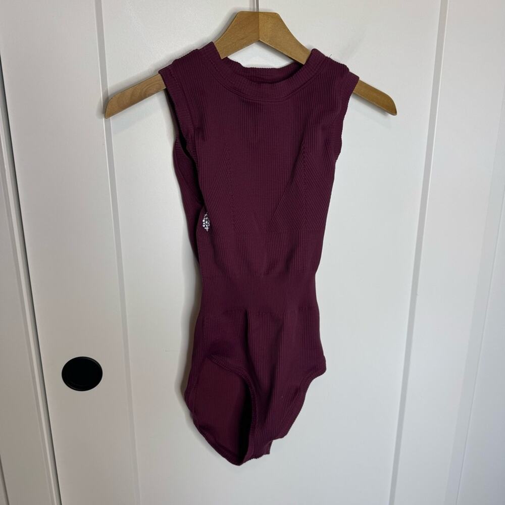 FP Movement by Free People Ribbed Sleeveless Bodysuit in Wine